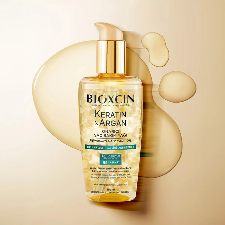 روغن آرگان ضدریزش و ترمیم کننده بیوکسین BIOXCIN مدل کراتین و آرگان Keratin and Argan حجم 150 میل