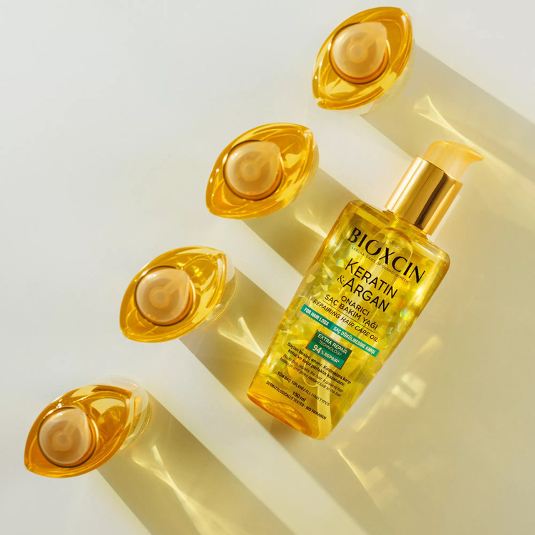 روغن آرگان ضدریزش و ترمیم کننده بیوکسین BIOXCIN مدل کراتین و آرگان Keratin and Argan حجم 150 میل